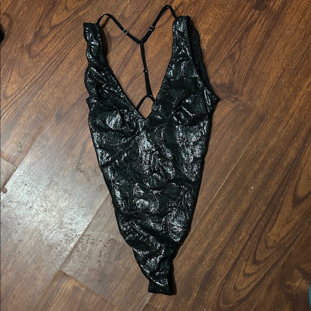 Victoria's Secret black glitter thong bodysuit.